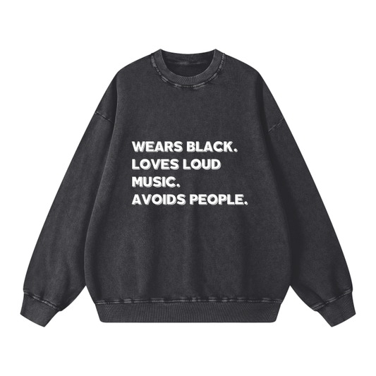 WEARS BLACK. SWEATSHIRT